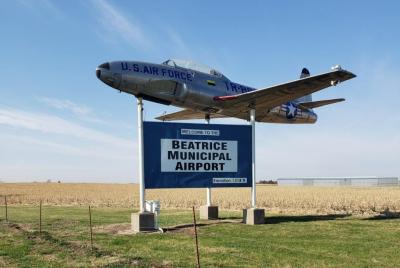 Airplane and entrance sign to Beatrice Municipal Airport