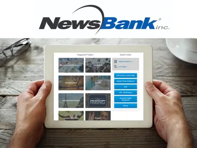 Hands holding a tablet displaying NewsBank website