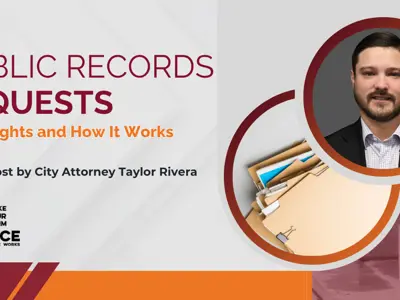 File folders and City Attorney Taylor Rivera